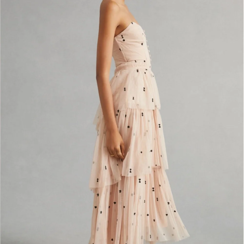 Maeve Strapless Blush Pink Tiered Tulle Maxi Dress with Black Dot Embellishments - Picture 2 of 5